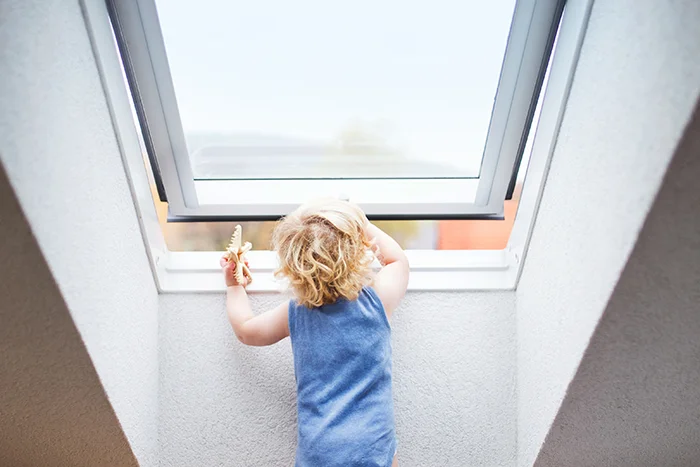 kid opening the ceiling window